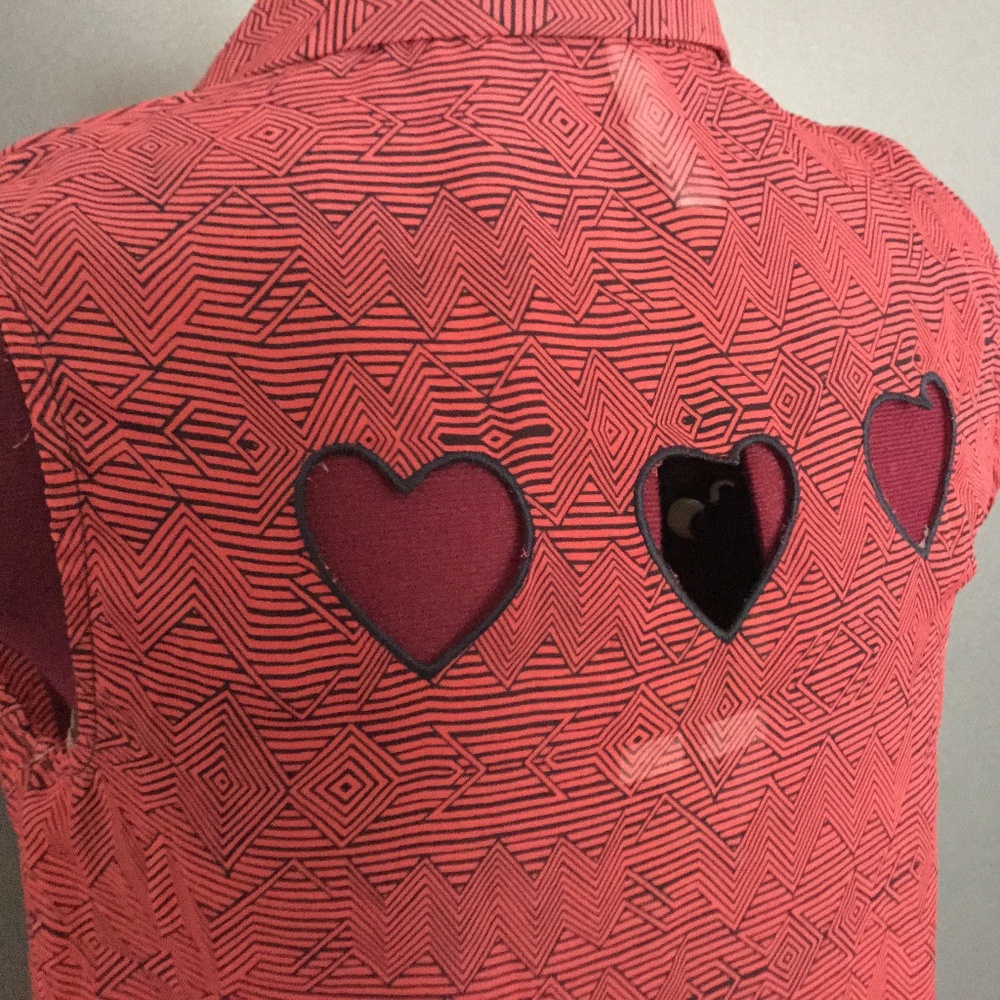 Geometric pink tank top with heart cutouts